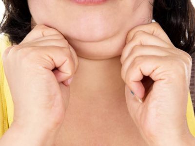 girl shows off his big chin isolated on white background